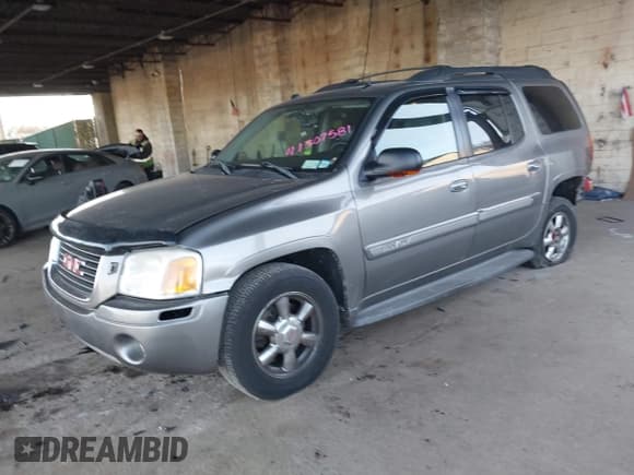 ✅ 2005 GMC Envoy SLT • VIN: 1GKET16S556177504 • Лот: 41307581. Опубликован ранее на IAAI с пробегом 131 102 миль. Бесплатный доступ к архиву аукционных продаж из США и подробный отчёт об истории автомобиля на DreamBid. Изображение 2.