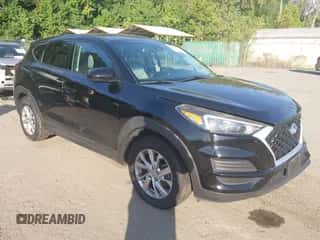 2019 Hyundai Tucson SE with VIN KM8J2CA40KU001142, listed as a IAAI auction lot 43362303 with 70,504 mi miles and . Bid and sale history available at DreamBid. Image 1.