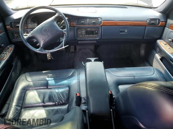 ✅ 1997 Cadillac DeVille • VIN: 1G6KD54Y2VU264494 • Lot: 67474365. Listed on Copart with 142,504 mi. Free auction sales archive from the USA and detailed vehicle history report at DreamBid. Image 8.