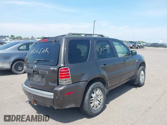 ✅ 2005 Mercury Mariner Luxury • VIN: 4M2CU571X5DJ03210 • Lot: 42747920. Listed on IAAI with 167,795 mi. Free auction sales archive from the USA and detailed vehicle history report at DreamBid. Image 4.