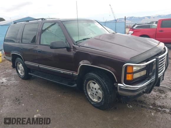 ✅ 1997 GMC Yukon • VIN: 1GKEK13R0VJ755574 • Lot: 41158932. Wystawiony na IAAI z przebiegiem 212 668 mil. Bezpłatny archiwum sprzedaży aukcyjnych z USA i szczegółowy raport historii pojazdu na DreamBid. Zdjęcie 1.