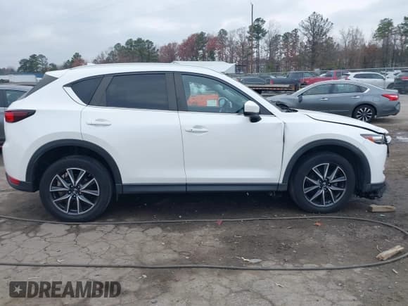 ✅ 2018 Mazda CX-5 Touring • VIN: JM3KFBCM9J0406319 • Lot: 43726839. Listed on IAAI with 50,499 mi. Free auction sales archive from the USA and detailed vehicle history report at DreamBid. Image 13.