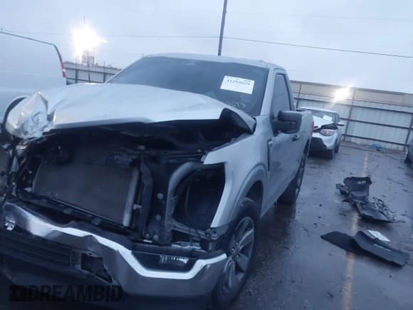 ✅ 2023 Ford F-150 XL • VIN: 1FTMF1C5XPKE47673 • Lot: 41293029. Listed on IAAI with 57,661 mi. Free auction sales archive from the USA and detailed vehicle history report at DreamBid. Image 17.