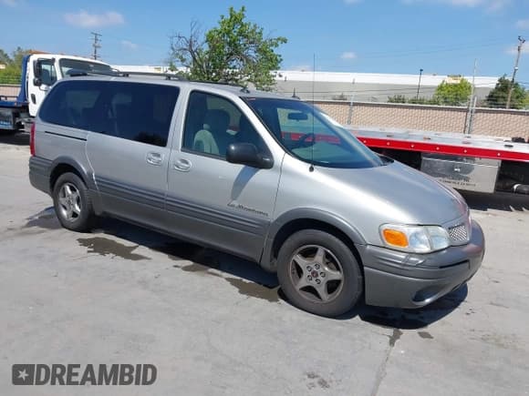 ✅ 2004 Pontiac Montana 1SA • VIN: 1GMDX03E14D192754 • Lot: 42039867. Wystawiony na IAAI z przebiegiem 131 291 mil. Bezpłatny archiwum sprzedaży aukcyjnych z USA i szczegółowy raport historii pojazdu na DreamBid. Zdjęcie 1.