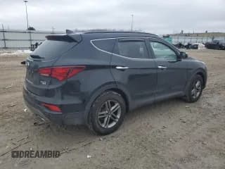 ✅ 2018 Hyundai Santa Fe 2.4L • VIN: 5NMZUDLB0JH103145 • Лот: 40994924. Опубликован ранее на Copart с пробегом 104 294 миль. Бесплатный доступ к архиву аукционных продаж из США и подробный отчёт об истории автомобиля на DreamBid. Изображение 3.