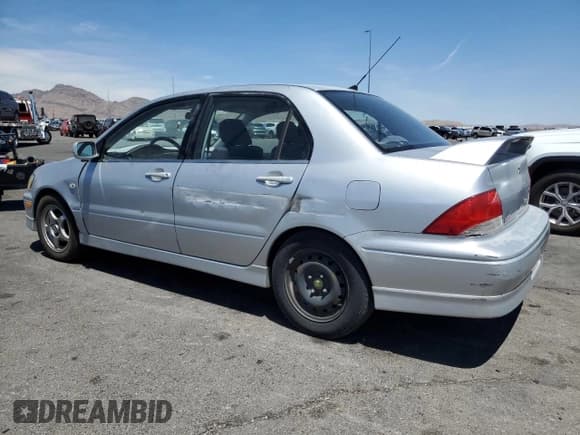 ✅ 2002 Mitsubishi Lancer OZ-Rally • VIN: JA3AJ86E12U057563 • Lot: 67379775. Listed on Copart with 187,217 mi. Free auction sales archive from the USA and detailed vehicle history report at DreamBid. Image 2.