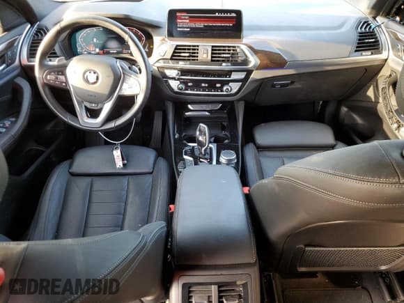 ✅ 2021 BMW X4 xDrive30i • VIN: 5UX2V1C01M9F43128 • Lot: 60580403. Wystawiony na Copart z przebiegiem 32 151 mil. Bezpłatny archiwum sprzedaży aukcyjnych z USA i szczegółowy raport historii pojazdu na DreamBid. Zdjęcie 8.