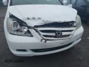 ✅ 2005 Honda Odyssey EX-L • VIN: 5FNRL38655B411556 • Lot: 43704042. Listed on IAAI with 205,713 mi. Free auction sales archive from the USA and detailed vehicle history report at DreamBid. Image 6.