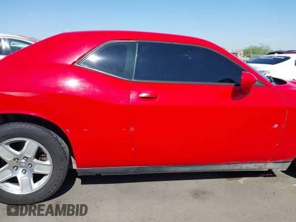 2014 Dodge Challenger SXT 100th Anniversary with VIN 2C3CDYAG1EH313481, listed as a IAAI auction lot 42460067 with 209,125 mi miles and . Bid and sale history available at DreamBid. Image 13.