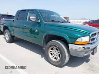 2003 Dodge Dakota SLT with VIN 1D7HG48NX3S278974, listed as a IAAI auction lot 42236636 with 105,211 mi miles and . Bid and sale history available at DreamBid. Image 1.