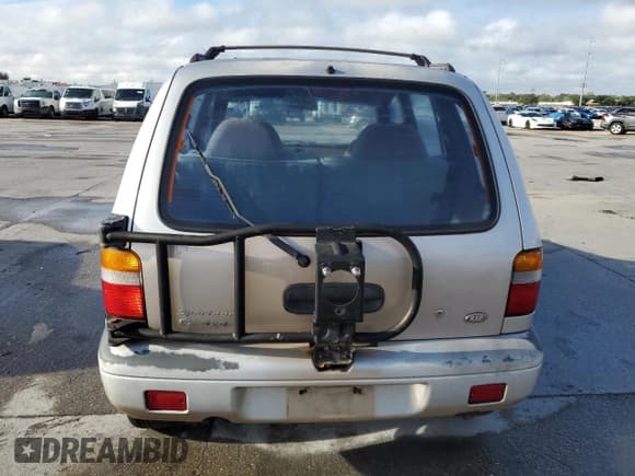 ✅ 1997 Kia Sportage • VIN: KNDJA7235V5538866 • Lot: 79728424. Wystawiony na Copart z przebiegiem 117 230 mil. Bezpłatny archiwum sprzedaży aukcyjnych z USA i szczegółowy raport historii pojazdu na DreamBid. Zdjęcie 6.