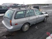 ✅ 1999 Ford Escort SE • VIN: 3FAFP15P0XR202242 • Lot: 43815870. Wystawiony na IAAI z przebiegiem 141 754 mil. Bezpłatny archiwum sprzedaży aukcyjnych z USA i szczegółowy raport historii pojazdu na DreamBid. Zdjęcie 4.