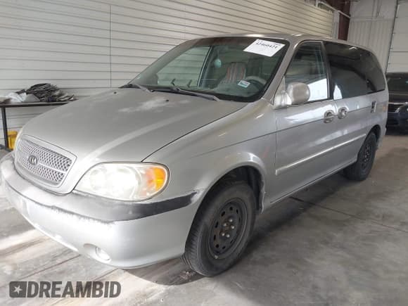 ✅ 2004 Kia Sedona LX • VIN: KNDUP131046505045 • Lot: 42460421. Listed on IAAI with 197,803 mi. Free auction sales archive from the USA and detailed vehicle history report at DreamBid. Image 2.