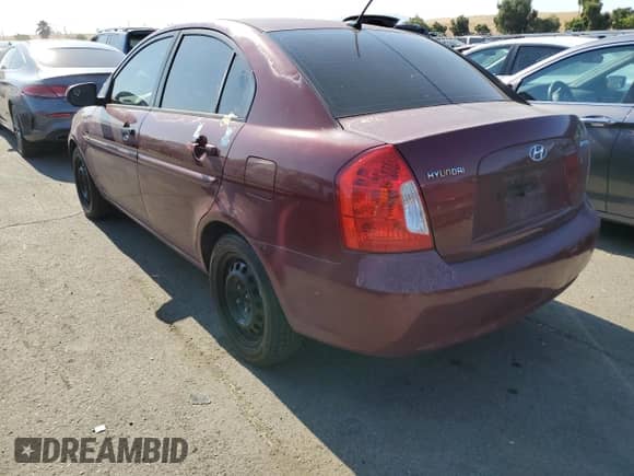 2010 Hyundai Accent GLS z VIN KMHCN4AC6AU423086, wystawiony jako Copart lot #62217374 z przebiegiem 205 962 mil mil oraz Szkoda całkowita • Salvage title. Historia ofert i sprzedaży dostępna na DreamBid. Obrazek 2.