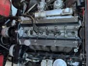 ✅ 1969 Jaguar E-Type • VIN: 1R42364BW • Lot: 86190205. Wystawiony na Copart z przebiegiem 45 742 mil. Bezpłatny archiwum sprzedaży aukcyjnych z USA i szczegółowy raport historii pojazdu na DreamBid. Zdjęcie 7.