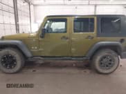 ✅ 2007 Jeep Wrangler X • VIN: 1J4GA391X7L157420 • Lot: 42940955. Listed on IAAI with 143,867 mi. Free auction sales archive from the USA and detailed vehicle history report at DreamBid. Image 15.