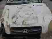 2007 Hyundai Tucson SE z VIN KM8JN12D77U631936, wystawiony jako Copart lot #73981684 z przebiegiem Nie podano mil oraz Nie do naprawy • Non repairable. Historia ofert i sprzedaży dostępna na DreamBid. Obrazek 13.