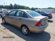 ✅ 2003 Ford Focus SE • VIN: 1FAFP34Z03W319082 • Lot: 42821718. Wystawiony na IAAI z przebiegiem 172 797 mil. Bezpłatny archiwum sprzedaży aukcyjnych z USA i szczegółowy raport historii pojazdu na DreamBid. Zdjęcie 3.