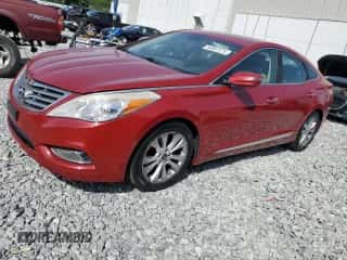 2013 Hyundai Azera z VIN KMHFG4JG2DA249081, wystawiony jako Copart lot #54067375 z przebiegiem 150 350 mil mil oraz Czysty tytuł • Clean title. Historia ofert i sprzedaży dostępna na DreamBid. Obrazek 1.