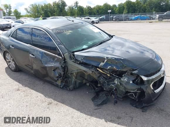 2016 Chevrolet Malibu LTZ z VIN 1G11E5SA4GU105094, wystawiony jako IAAI lot #43108630 z przebiegiem 105 242 mil mil oraz . Historia ofert i sprzedaży dostępna na DreamBid. Obrazek 1.