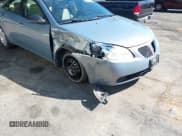 ✅ 2009 Pontiac G6 1SA • VIN: 1G2ZG57B594116330 • Lot: 43245062. Listed on IAAI with 152,757 mi. Free auction sales archive from the USA and detailed vehicle history report at DreamBid. Image 6.