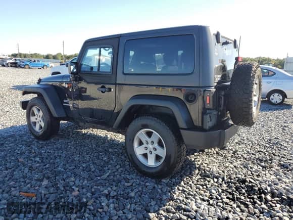 2012 Jeep Wrangler Sport with VIN 1C4AJWAG6CL137608, listed as a Copart auction lot 86428595 with 140,407 mi miles and Salvage title. Bid and sale history available at DreamBid. Image 2.
