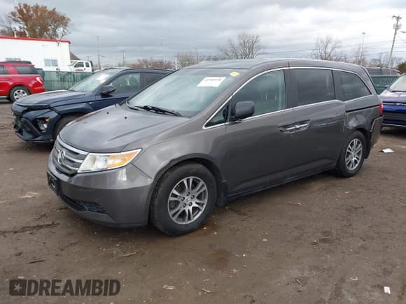 ✅ 2012 Honda Odyssey EX-L • VIN: 5FNRL5H61CB035527 • Lot: 43789118. Listed on IAAI with 163,426 mi. Free auction sales archive from the USA and detailed vehicle history report at DreamBid. Image 17.