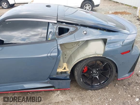 ✅ 2024 Nissan Z Nismo • VIN: JN1BZ4CH7RM360818 • Lot: 42733312. Listed on IAAI with 3,306 mi. Free auction sales archive from the USA and detailed vehicle history report at DreamBid. Image 6.