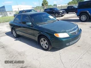 ✅ 2002 Mazda Protege DX • VIN: JM1BJ225X20525208 • Lot: 42746035. Wystawiony na IAAI z przebiegiem Nie podano. Bezpłatny archiwum sprzedaży aukcyjnych z USA i szczegółowy raport historii pojazdu na DreamBid. Zdjęcie 1.