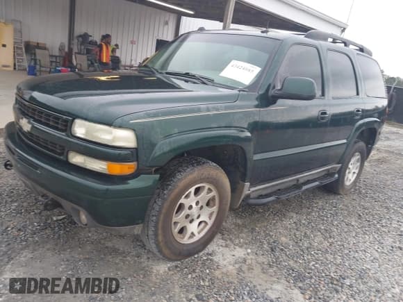 ✅ 2004 Chevrolet Tahoe LT • VIN: 1GNEK13Z74R183809 • Lot: 43424085. Listed on IAAI with 320,987 mi. Free auction sales archive from the USA and detailed vehicle history report at DreamBid. Image 2.