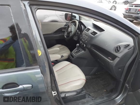 ✅ 2012 Mazda 5 Grand Touring • VIN: JM1CW2DLXC0124793 • Lot: 43796644. Listed on IAAI with 146,822 mi. Free auction sales archive from the USA and detailed vehicle history report at DreamBid. Image 5.