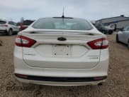 ✅ 2016 Ford Fusion Titanium Hybrid • VIN: 3FA6P0RU7GR172893 • Лот: 49955625. Опубликован ранее на Copart с пробегом 159 269 миль. Бесплатный доступ к архиву аукционных продаж из США и подробный отчёт об истории автомобиля на DreamBid. Изображение 6.