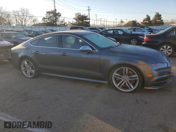 ✅ 2018 Audi S7 • VIN: WAUWFBFC3JN097198 • Lot: 38903844. Listed on Copart with 86,654 mi. Free auction sales archive from the USA and detailed vehicle history report at DreamBid. Image 4.