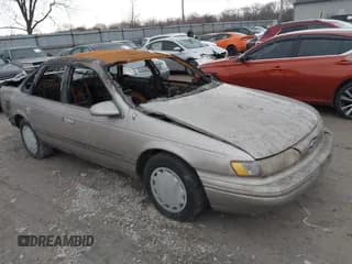 ✅ 1994 Ford Taurus GL • VIN: 1FALP52U6RA258445 • Lot: 41512672. Listed on IAAI with Not provided. Free auction sales archive from the USA and detailed vehicle history report at DreamBid. Image 1.