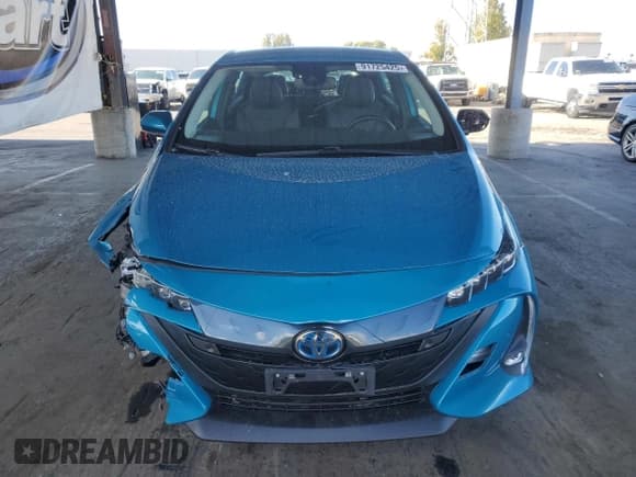 ✅ 2021 Toyota Prius LE • VIN: JTDKAMFP3M3188745 • Lot: 91725425. Listed on Copart with 62,271 mi. Free auction sales archive from the USA and detailed vehicle history report at DreamBid. Image 5.