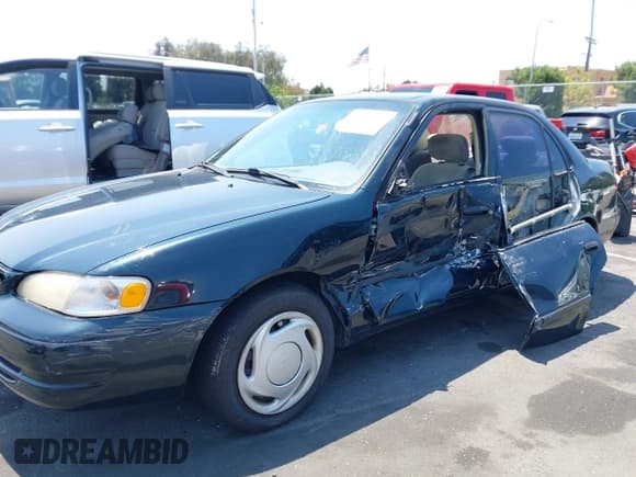 ✅ 1999 Toyota Corolla VE • VIN: 1NXBR12E4XZ251809 • Lot: 42910359. Listed on IAAI with 150,200 mi. Free auction sales archive from the USA and detailed vehicle history report at DreamBid. Image 6.