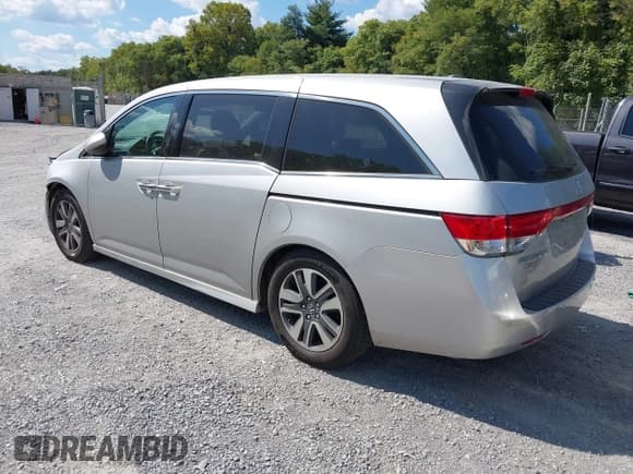 ✅ 2014 Honda Odyssey Touring • VIN: 5FNRL5H98EB069624 • Лот: 43208502. Опубликован ранее на IAAI с пробегом 186 480 миль. Бесплатный доступ к архиву аукционных продаж из США и подробный отчёт об истории автомобиля на DreamBid. Изображение 3.