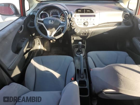 ✅ 2012 Honda Fit • VIN: JHMGE8G3XCC031353 • Lot: 70990325. Wystawiony na Copart z przebiegiem 131 299 mil. Bezpłatny archiwum sprzedaży aukcyjnych z USA i szczegółowy raport historii pojazdu na DreamBid. Zdjęcie 8.