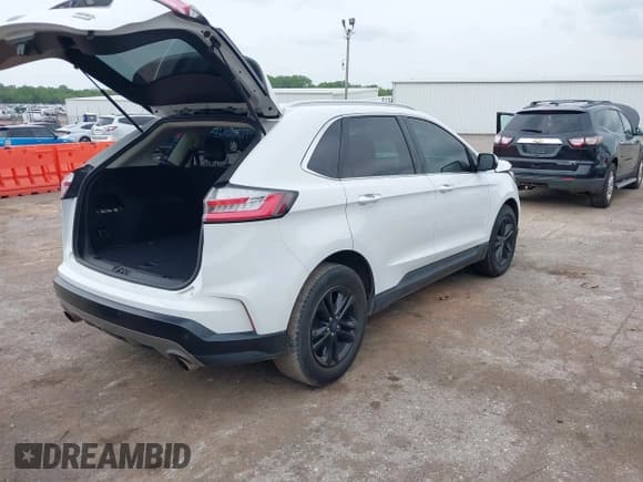 ✅ 2019 Ford Edge SEL • VIN: 2FMPK3J9XKBC35557 • Lot: 42120049. Listed on IAAI with 130,452 mi. Free auction sales archive from the USA and detailed vehicle history report at DreamBid. Image 4.