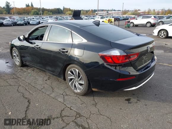 ✅ 2022 Honda Insight Touring • VIN: 19XZE4F90NE013867 • Lot: 43581669. Listed on IAAI with Not provided. Free auction sales archive from the USA and detailed vehicle history report at DreamBid. Image 3.