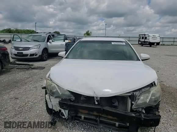 2014 Toyota Camry L with VIN 4T1BF1FK0EU385397, listed as a Copart auction lot 62869235 with 168,702 mi miles and Salvage title. Bid and sale history available at DreamBid. Image 14.