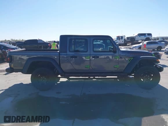 ✅ 2023 Jeep Gladiator Mojave • VIN: 1C6JJTEGXPL517914 • Lot: 43666074. Listed on IAAI with 33,445 mi. Free auction sales archive from the USA and detailed vehicle history report at DreamBid. Image 14.