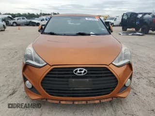 ✅ 2014 Hyundai Veloster Turbo • VIN: KMHTC6AE7EU210950 • Lot: 88154055. Wystawiony na Copart z przebiegiem 135 628 mil. Bezpłatny archiwum sprzedaży aukcyjnych z USA i szczegółowy raport historii pojazdu na DreamBid. Zdjęcie 5.