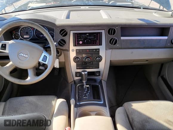 ✅ 2010 Jeep Commander Sport • VIN: 1J4RH4GK9AC147040 • Лот: 51951625. Опубликован ранее на Copart с пробегом 89 213 миль. Бесплатный доступ к архиву аукционных продаж из США и подробный отчёт об истории автомобиля на DreamBid. Изображение 9.