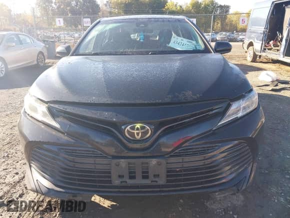 2019 Toyota Camry LE with VIN 4T1B11HK1KU697946, listed as a IAAI auction lot 43424429 with 289,881 mi miles and . Bid and sale history available at DreamBid. Image 12.