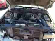 2002 Chevrolet Blazer LS z VIN 1GNDT13W22K190722, wystawiony jako Copart lot #68576164 z przebiegiem 124 420 mil mil oraz Szkoda całkowita • Salvage title. Historia ofert i sprzedaży dostępna na DreamBid. Obrazek 12.