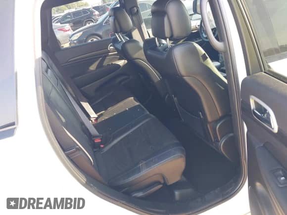 2022 Jeep Grand Cherokee Laredo E with VIN 1C4RJEAGXNC127857, listed as a IAAI auction lot 43202403 with 66,201 mi miles and . Bid and sale history available at DreamBid. Image 8.