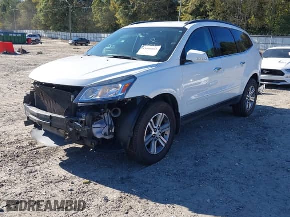 2016 Chevrolet Traverse LT z VIN 1GNKVHKD1GJ232420, wystawiony jako IAAI lot #43446663 z przebiegiem 206 500 mil mil oraz . Historia ofert i sprzedaży dostępna na DreamBid. Obrazek 2.