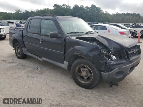 ✅ 2004 Ford Explorer Sport Trac XLS • VIN: 1FMZU77KX4UA88786 • Lot: 66201825. Listed on Copart with 128,137 mi. Free auction sales archive from the USA and detailed vehicle history report at DreamBid. Image 4.