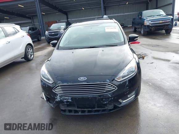 ✅ 2017 Ford Focus Titanium • VIN: 1FADP3J26HL267951 • Lot: 43728220. Listed on IAAI with 84,043 mi. Free auction sales archive from the USA and detailed vehicle history report at DreamBid. Image 12.